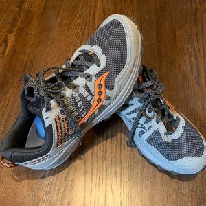 Brand new Saucony Trail running shoe size 12w